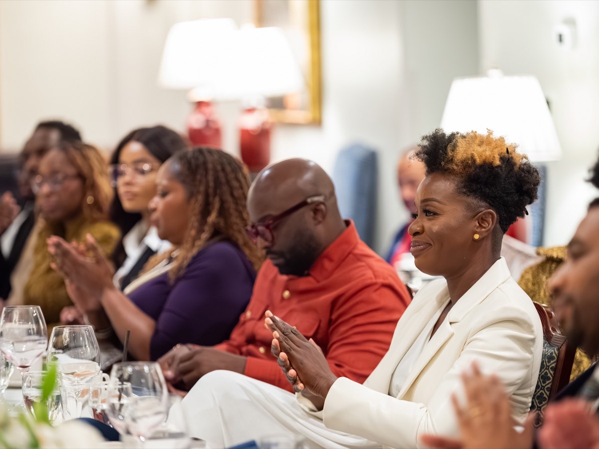 Guests listening from around the table during the Roundtable