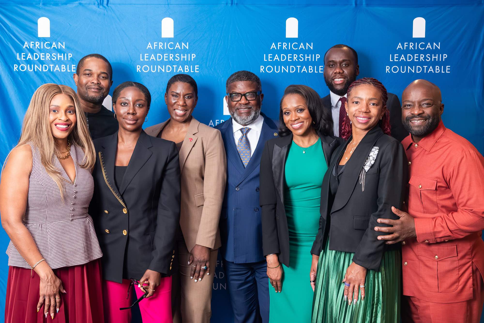 Leaders gathered for a group portrait beside the African Leadership Roundtable backdrop